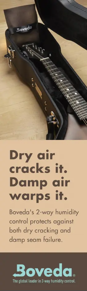 mandolin and Boveda humidifer inside a mandolin hard-shell case